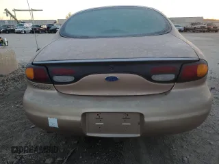 1997 Ford Taurus GL z VIN 1FALP52U9VG142664, wystawiony jako Copart lot #84054224 z przebiegiem 151 610 mil mil oraz Czysty tytuł • Clean title. Historia ofert i sprzedaży dostępna na DreamBid. Obrazek 6.