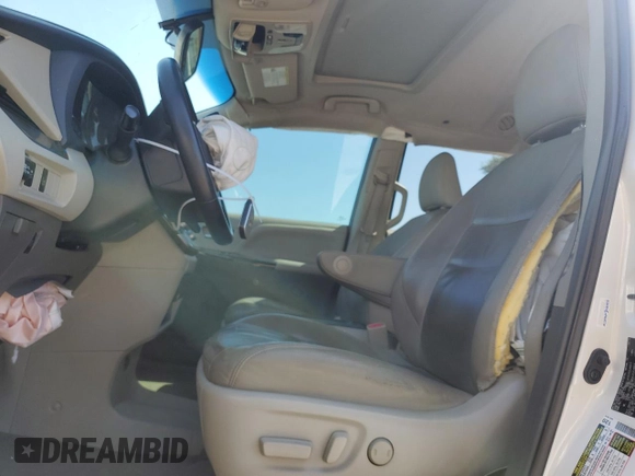 2015 Toyota Sienna XLE with VIN 5TDYK3DC1FS612491, listed as a Copart auction lot 53673815 with 169,306 mi miles and Salvage Title. Bid and sale history available at DreamBid. Image 7.