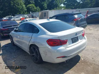 2019 BMW 4 Series 430i z VIN WBA4J1C5XKBM17853, wystawiony jako IAAI lot #39758988 z przebiegiem 38 520 mil mil oraz . Historia ofert i sprzedaży dostępna na DreamBid. Obrazek 3.