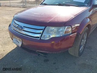 2008 Ford Taurus X Limited with VIN 1FMDK03W68GA11448, listed as a IAAI auction lot 41742657 with 197,694 mi miles. Bid and sale history available at carsss.com. Image 6.
