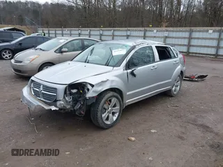 2010 Dodge Caliber SXT z VIN 1B3CB4HA1AD663892, wystawiony jako IAAI lot #41535071 z przebiegiem 186 900 mil mil oraz . Historia ofert i sprzedaży dostępna na DreamBid. Obrazek 6.