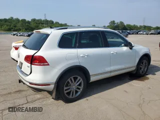 2016 Volkswagen Touareg Sport z VIN WVGEP9BPXGD005351, wystawiony jako Copart lot #60719065 z przebiegiem 133 674 mil mil oraz Czysty tytuł • Clean title. Historia ofert i sprzedaży dostępna na DreamBid. Obrazek 3.
