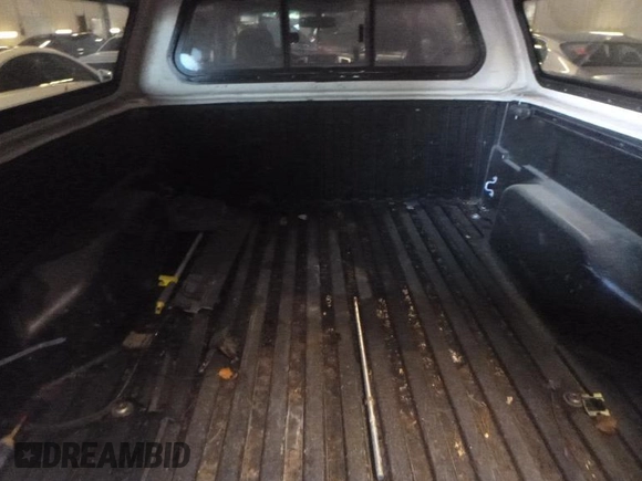 2013 Toyota Tacoma with VIN 3TMMU4FN6DM062201, listed as a IAAI auction lot 42906789 with 266,431 mi miles and . Bid and sale history available at DreamBid. Image 26.