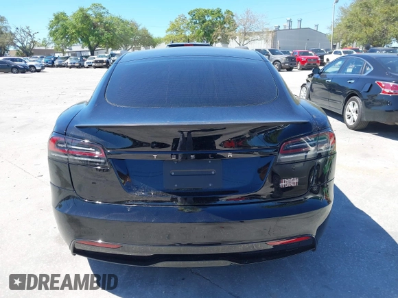 2023 Tesla Model S Plaid with VIN 5YJSA1E67PF528171, listed as a IAAI auction lot 41831086 with Not provided miles and . Bid and sale history available at DreamBid. Image 15.