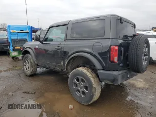 2023 Ford Bronco with VIN 1FMDE5AH6PLB56147, listed as a Copart auction lot 85275394 with 24,594 mi miles and Salvage title. Bid and sale history available at DreamBid. Image 2.