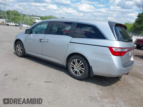 2012 Honda Odyssey EX-L with VIN 5FNRL5H67CB139701, listed as a IAAI auction lot 42233283 with 147,143 mi miles and . Bid and sale history available at DreamBid. Image 3.