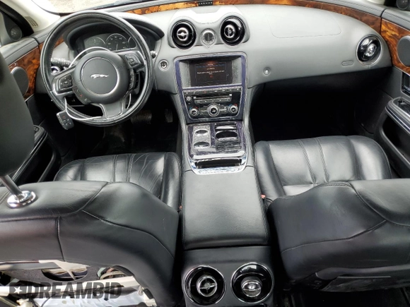 2013 Jaguar XJ с VIN SAJWJ1CD8D8V52463, выставлен на аукционе Copart как лот 61772115 с пробегом 123 899 миль миль и Чистый • Clean title. История ставок и продаж доступна на DreamBid. Изображение 8.