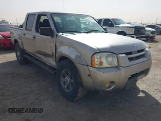 2004 Nissan Frontier XE z VIN 1N6ED27T54C427374, wystawiony jako IAAI lot #41712499 z przebiegiem 218 902 mil mil oraz . Historia ofert i sprzedaży dostępna na DreamBid. Obrazek 1.