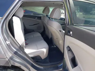 2016 Hyundai Tucson Sport with VIN KM8J33A2XGU022633, listed as a IAAI auction lot 41990348 with 73,395 mi miles. Bid and sale history available at carsss.com. Image 8.