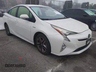 2017 Toyota Prius Two with VIN JTDKARFUXH3037751, listed as a IAAI auction lot 41471974 with 140,787 mi miles. Bid and sale history available at carsss.com. Image 1.