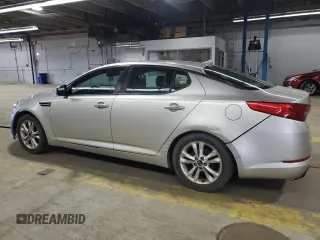 2011 Kia Optima EX with VIN KNAGN4A70B5071155, listed as a Copart auction lot 52201275 with 206,675 mi miles and Salvage Title. Bid and sale history available at carsss.com. Image 2.