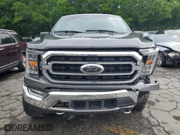 2021 Ford F-150 XL with VIN 1FTEW1EP0MFB98114, listed as a Copart auction lot 55892705 with 47,619 mi miles and Salvage title. Bid and sale history available at DreamBid. Image 5.