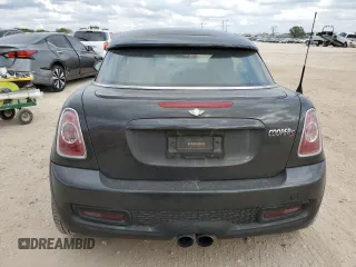 2014 MINI Coupe S z VIN WMWSX3C59ET409209, wystawiony jako Copart lot #78886564 z przebiegiem 118 632 mil mil oraz Tytuł czysty. Historia ofert i sprzedaży dostępna na DreamBid. Obrazek 6.