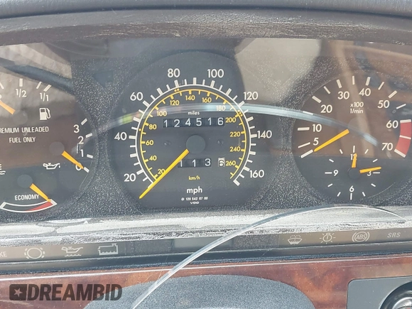 1990 Mercedes-Benz 560 with VIN WDBCA45E9LA549067, listed as a IAAI auction lot 41849642 with 124,516 mi miles and . Bid and sale history available at DreamBid. Image 7.