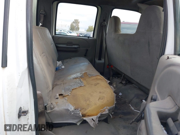1999 Ford F-350 with VIN 1FDSW34S7XEC82702, listed as a IAAI auction lot 40346052 with 142,159 mi miles and . Bid and sale history available at DreamBid. Image 8.