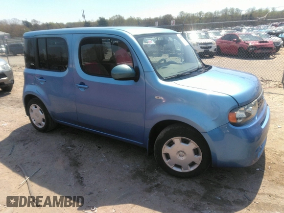 2013 Nissan Cube SL z VIN JN8AZ2KR3DT303672, wystawiony jako IAAI lot #41899753 z przebiegiem 117 840 mil mil oraz . Historia ofert i sprzedaży dostępna na DreamBid. Obrazek 1.