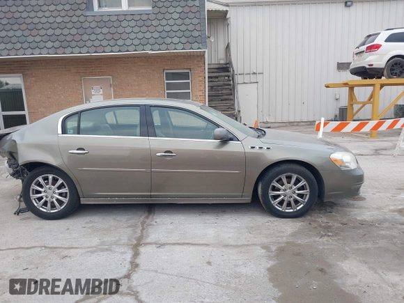 2011 Buick Lucerne CXL Premium with VIN 1G4HJ5EM0BU104715, listed as a IAAI auction lot 41706751 with 123,636 mi miles. Bid and sale history available at carsss.com. Image 13.