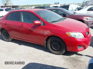 2009 Toyota Corolla with VIN 1NXBU40E09Z049359, listed as a IAAI auction lot 42041746 with 211,167 mi miles. Bid and sale history available at carsss.com. Image 1.