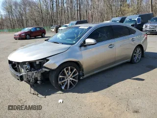 2014 Toyota Avalon Limited with VIN 4T1BK1EB4EU080093, listed as a Copart auction lot 54106595 with 108,995 mi miles and Salvage Title. Bid and sale history available at DreamBid. Image 1.