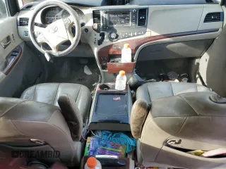 2011 Toyota Sienna XLE with VIN 5TDDK3DCXBS024257, listed as a Copart auction lot 60667145 with 283,609 mi miles and Salvage title. Bid and sale history available at DreamBid. Image 8.