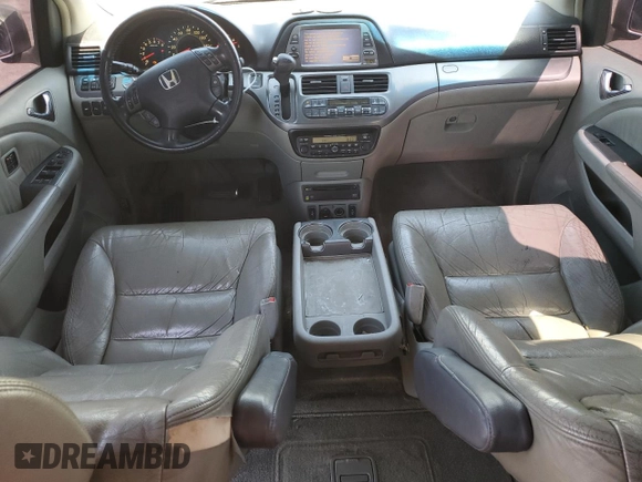 2005 Honda Odyssey Touring z VIN 5FNRL38805B131416, wystawiony jako Copart lot #59157395 z przebiegiem 263 087 mil mil oraz Szkoda całkowita • Salvage title. Historia ofert i sprzedaży dostępna na DreamBid. Obrazek 8.