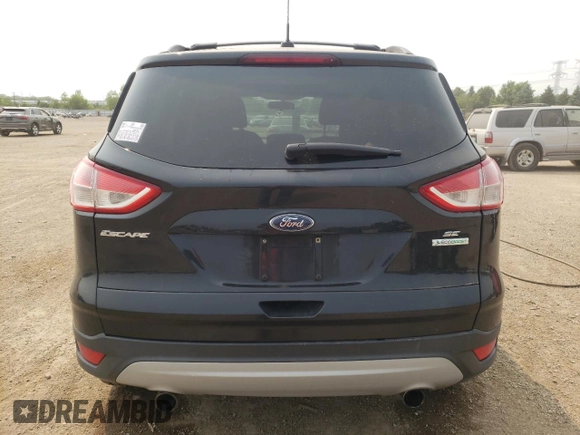 2013 Ford Escape SE with VIN 1FMCU0GXXDUA98419, listed as a Copart auction lot 59233695 with 151,615 mi miles and Salvage title. Bid and sale history available at DreamBid. Image 6.