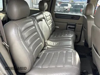 2003 Hummer H2 with VIN 5GRGN23UX3H124517, listed as a Copart auction lot 41650395 with 999,999 mi miles and Clean Title. Bid and sale history available at carsss.com. Image 6.