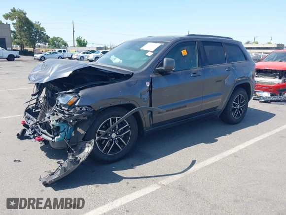2017 Jeep Grand Cherokee Trailhawk with VIN 1C4RJFLG7HC654259, listed as a IAAI auction lot 42510197 with 103,947 mi miles and . Bid and sale history available at DreamBid. Image 2.