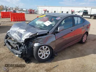 2014 Hyundai Accent GLS with VIN KMHCT4AE9EU614191, listed as a IAAI auction lot 37899279 with 144,247 mi miles. Bid and sale history available at carsss.com. Image 2.