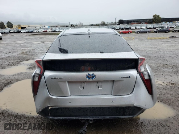 2017 Toyota Prius Two with VIN JTDKBRFU7H3566152, listed as a Copart auction lot 48227095 with 102,768 mi miles and Salvage Title. Bid and sale history available at DreamBid. Image 6.