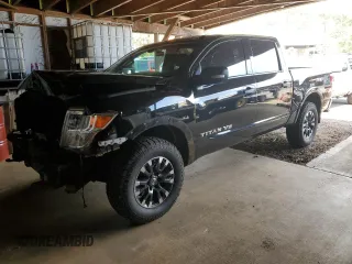 2018 Nissan Titan Pro-4X z VIN 1N6AA1E51JN531463, wystawiony jako Copart lot #52995885 z przebiegiem 62 873 mil mil oraz Szkoda całkowita • Salvage title. Historia ofert i sprzedaży dostępna na DreamBid. Obrazek 1.