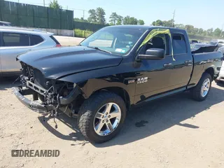 2014 Ram 1500 Tradesman with VIN 1C6RR7FT3ES380655, listed as a IAAI auction lot 42530131 with 96,370 mi miles and . Bid and sale history available at DreamBid. Image 2.