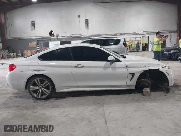 2014 BMW 4 Series 435i xDrive with VIN WBA3R5C54EK186187, listed as a IAAI auction lot 42248064 with 73,532 mi miles and . Bid and sale history available at DreamBid. Image 13.