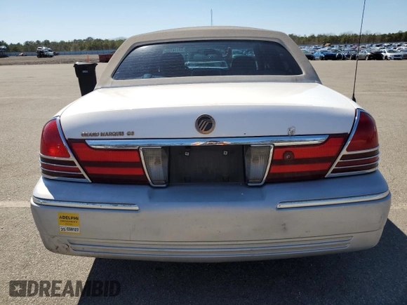 2005 Mercury Grand Marquis GS with VIN 2MEFM74W55X654070, listed as a Copart auction lot 53114785 with 56,128 mi miles and Salvage Title. Bid and sale history available at DreamBid. Image 6.