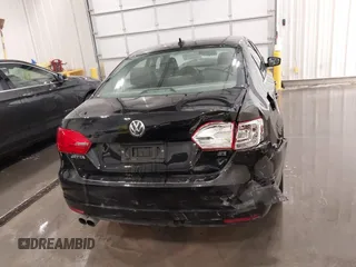 2014 Volkswagen Jetta SE with VIN 3VWD07AJ3EM437025, listed as a IAAI auction lot 42189870 with 96,530 mi miles and . Bid and sale history available at DreamBid. Image 16.