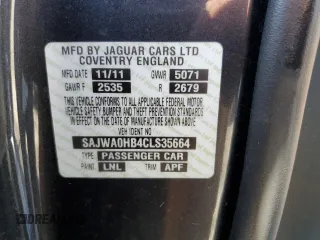 2012 Jaguar XF Portfolio with VIN SAJWA0HB4CLS35664, listed as a Copart auction lot 53427265 with 98,731 mi miles and Salvage Title. Bid and sale history available at carsss.com. Image 13.
