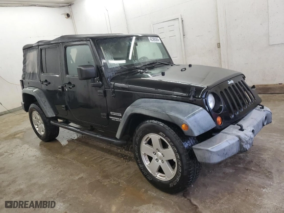 2012 Jeep Wrangler Unlimited Sport with VIN 1C4BJWDG3CL141826, listed as a Copart auction lot 42399365 with 170,022 mi miles and Salvage Title. Bid and sale history available at carsss.com. Image 4.