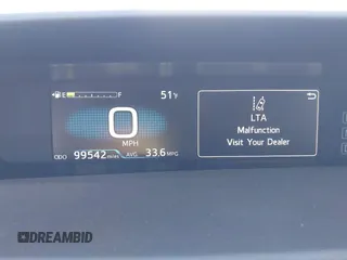2021 Toyota Prius L Eco with VIN JTDKAMFU0M3149875, listed as a IAAI auction lot 41966010 with 99,542 mi miles. Bid and sale history available at carsss.com. Image 16.