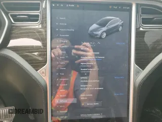 2016 Tesla Model X 70D z VIN 5YJXCBE23GF005295, wystawiony jako Copart lot #51034005 z przebiegiem 130 325 mil mil oraz Szkody całkowita. Historia ofert i sprzedaży dostępna na DreamBid. Obrazek 9.