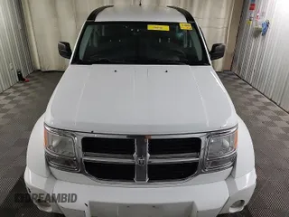 2011 Dodge Nitro SE z VIN 1D4PT2GK2BW589063, wystawiony jako IAAI lot #42408917 z przebiegiem 160 504 mil mil oraz . Historia ofert i sprzedaży dostępna na DreamBid. Obrazek 3.