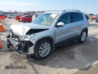 2011 Volkswagen Tiguan SE with VIN WVGBV7AX2BW562055, listed as a IAAI auction lot 41642084 with 175,407 mi miles and . Bid and sale history available at DreamBid. Image 2.