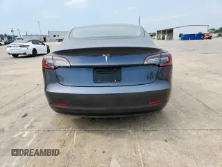 2023 Tesla Model 3 with VIN 5YJ3E1EA1PF468627, listed as a Copart auction lot 57285575 with 5,952 mi miles and Salvage title. Bid and sale history available at DreamBid. Image 6.