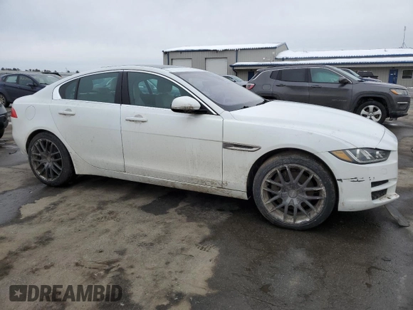 2019 Jaguar XE 25t Premium with VIN SAJAJ4FX0KCP50143, listed as a Copart auction lot 46303155 with 111,621 mi miles and Salvage Title. Bid and sale history available at DreamBid. Image 4.