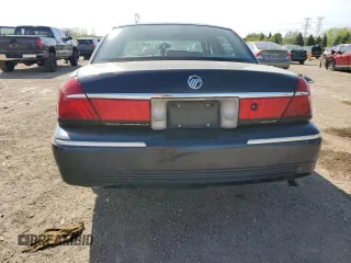 1999 Mercury Grand Marquis LS z VIN 2MEFM75W1XX635839, wystawiony jako Copart lot #55860735 z przebiegiem 114 963 mil mil oraz Szkody całkowita. Historia ofert i sprzedaży dostępna na DreamBid. Obrazek 6.
