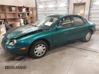1996 Ford Taurus GL z VIN 1FALP52U5TG110582, wystawiony jako IAAI lot #40858639 z przebiegiem 57 965 mil mil oraz . Historia ofert i sprzedaży dostępna na DreamBid. Obrazek 17.