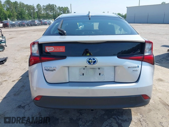 2021 Toyota Prius L Eco z VIN JTDKAMFU5M3137298, wystawiony jako IAAI lot #42270937 z przebiegiem 38 828 mil mil oraz . Historia ofert i sprzedaży dostępna na DreamBid. Obrazek 15.