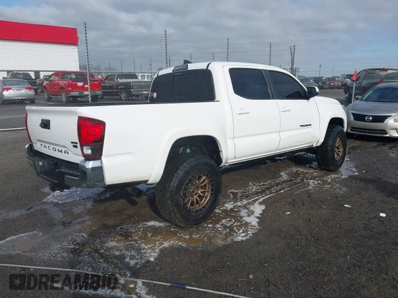 2019 Toyota Tacoma SR z VIN 3TMCZ5AN9KM284092, wystawiony jako IAAI lot #41774851 z przebiegiem 100 031 mil mil oraz . Historia ofert i sprzedaży dostępna na DreamBid. Obrazek 4.