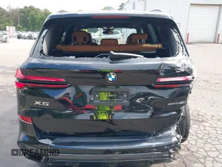 2025 BMW X5 xDrive40i with VIN 5UX23EU08S9Z12797, listed as a IAAI auction lot 42781495 with 7,393 mi miles and . Bid and sale history available at DreamBid. Image 16.
