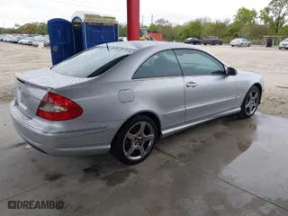 2006 Mercedes-Benz CLK-Class 5.0L with VIN WDBTJ75H76F200069, listed as a IAAI auction lot 41379101 with 173,699 mi miles. Bid and sale history available at carsss.com. Image 4.