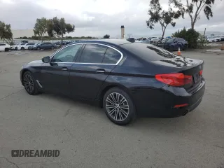 2018 BMW 5 Series 530i with VIN WBAJA5C51JWA38499, listed as a Copart auction lot 49150205 with 59,521 mi miles and Salvage Title. Bid and sale history available at DreamBid. Image 2.